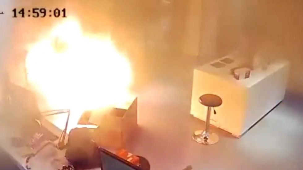 Electric vehicle battery explodes while charging in store in China