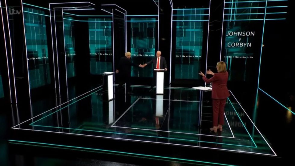 Johnson v Corbyn: Boris Johnson and Jeremy Corbyn share awkward handshake 