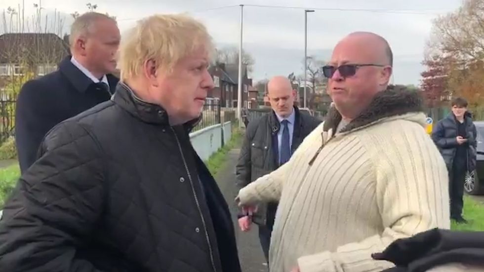 Boris Johnson speaks to local man in Manchester about Brexit and dog poo