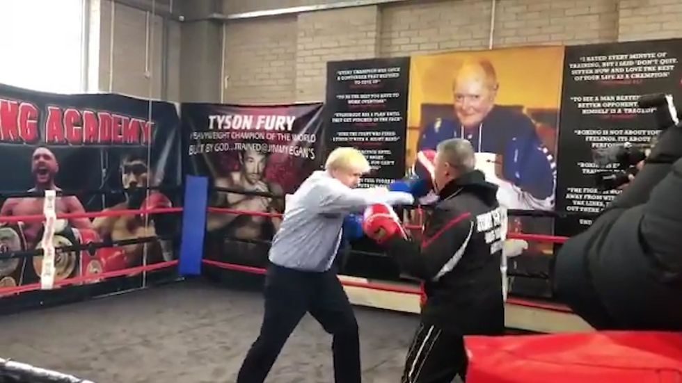Boris Johnson spars in a boxing ring ahead of ITV debate 