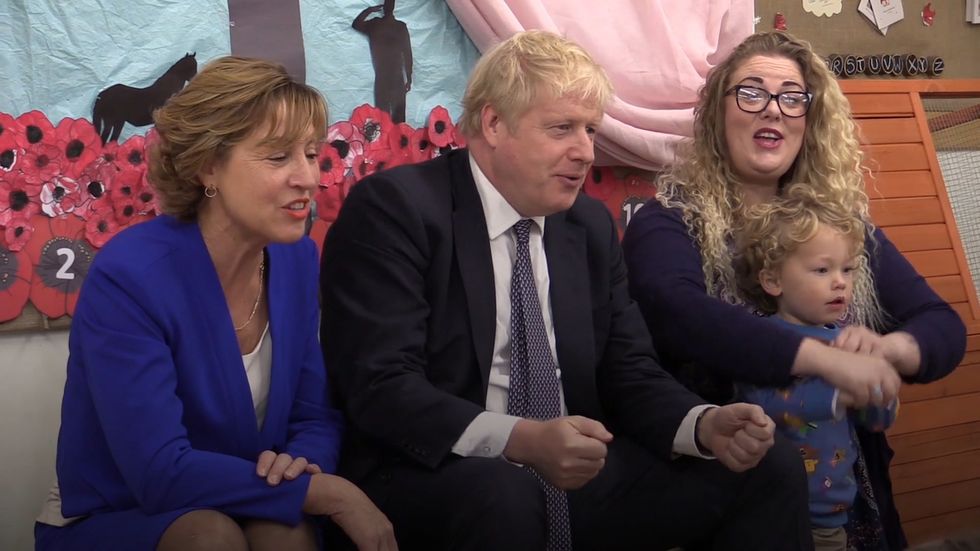 Boris Johnson sings The Wheels On The Bus during school visit