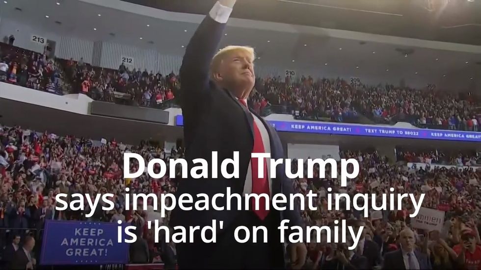 Trump says impeachment inquiry is hard on family