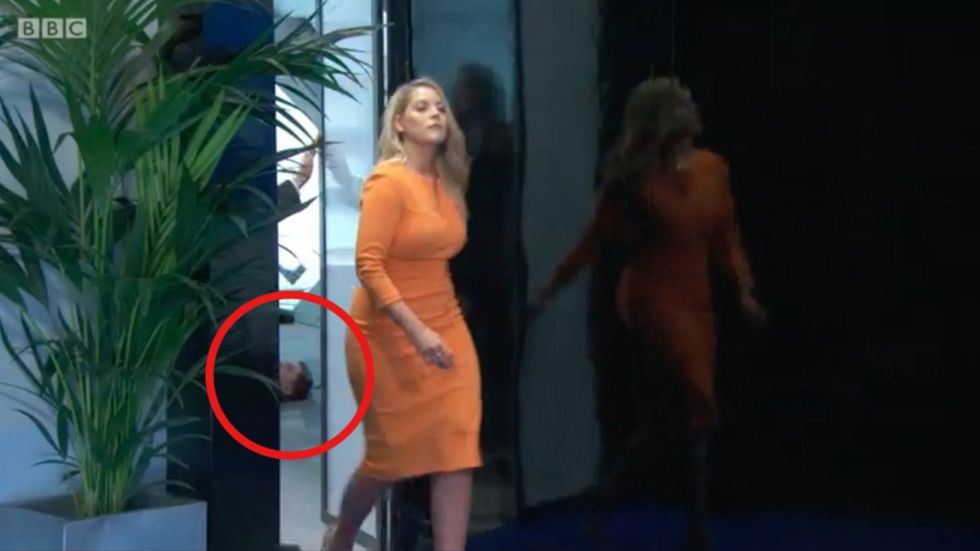 Man randomly seen lying on the boardroom floor in The Apprentice