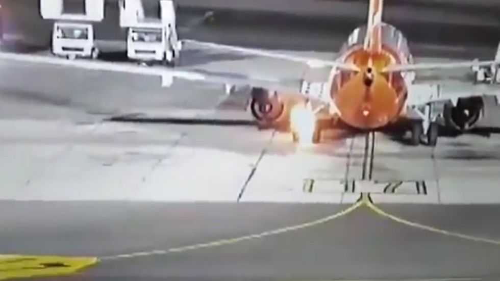 Plane's landing gear bursts into flame after touching down at Sharm El-Sheikh airport