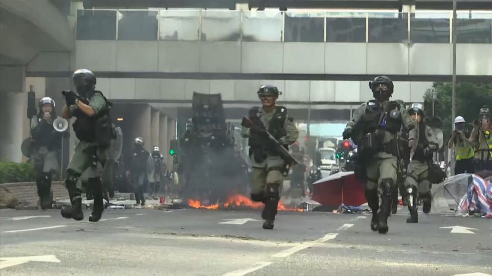 Police and protesters face off in Hong Kong