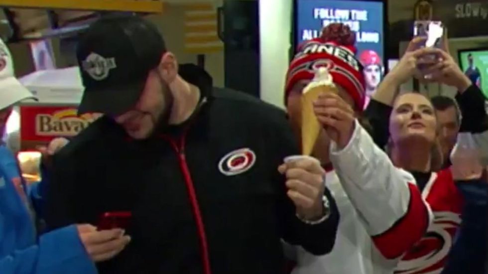 Man steals ice cream right out of someone's hand during Fox Sports broadcast