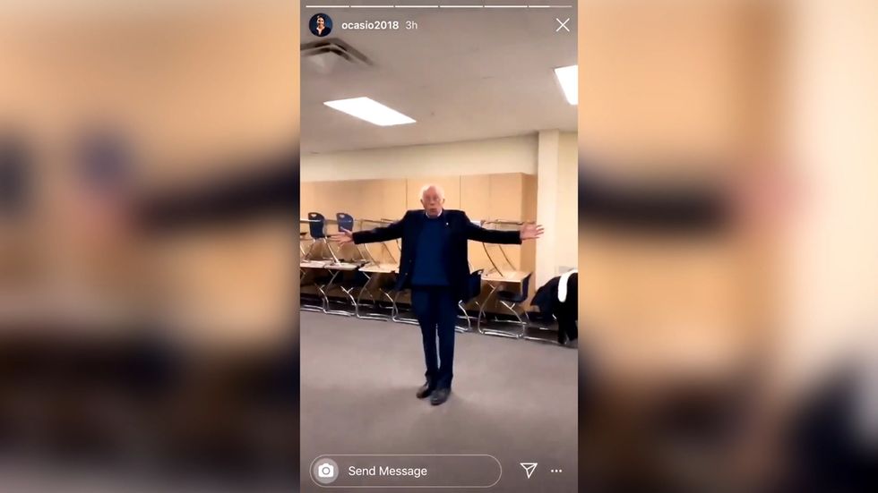 Alexandria Ocasio-Cortez surprises Bernie Sanders at Iowa rally