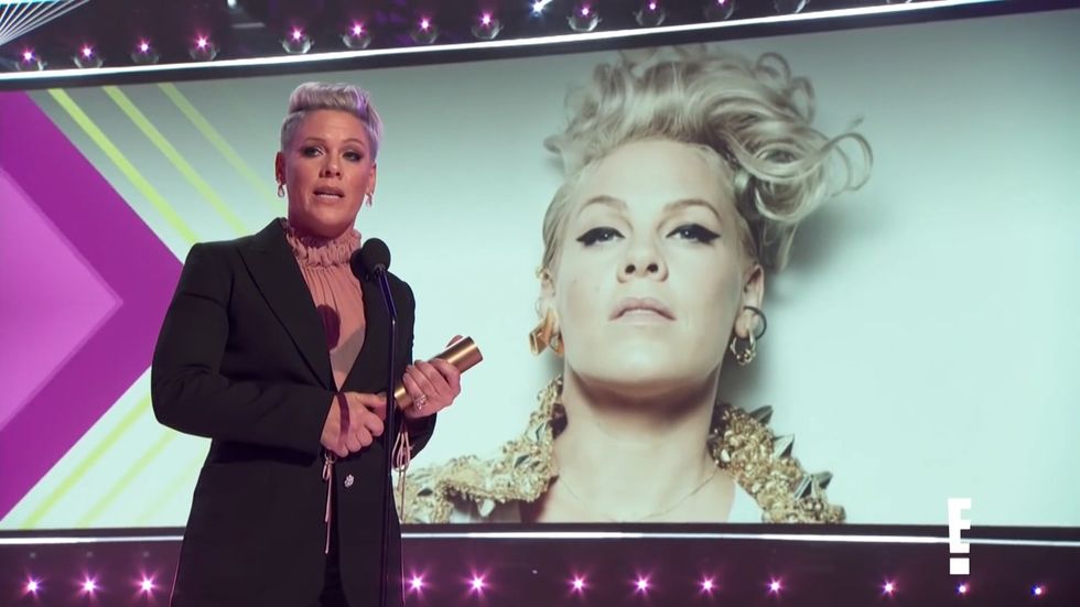 Pink urges people to 'change the f***ing world' during acceptance speech