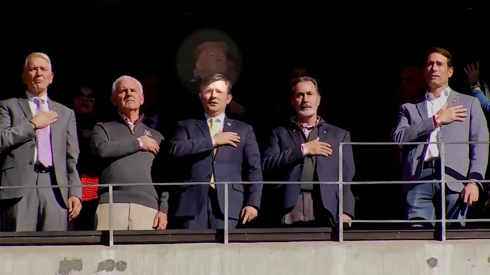Trump appears to forget words to national anthem