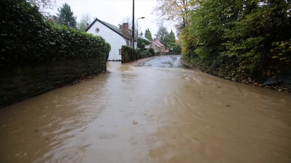Flooding swamps Whiston Brook area near Rotherham