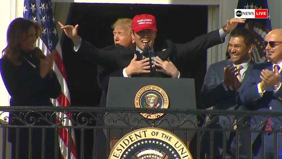 Donald Trump embraces Washington Nationals catcher Kurt Suzuki