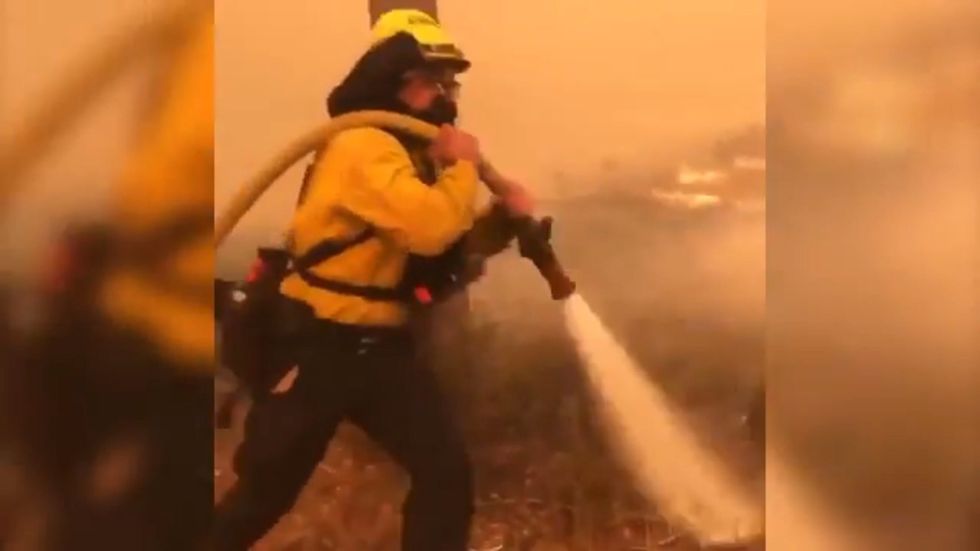 Firefighters battle against California fires