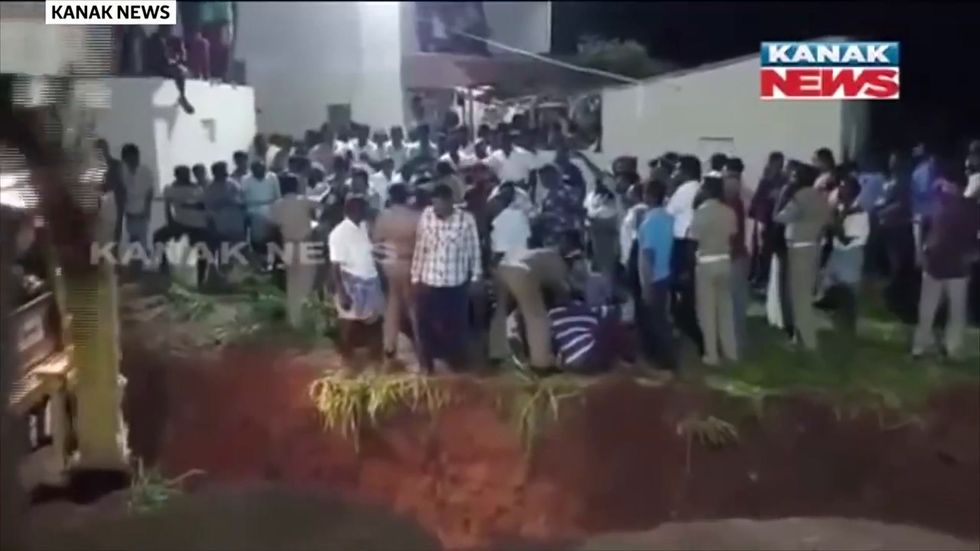 Community gathers to help rescue toddler stuck 100ft down well in India