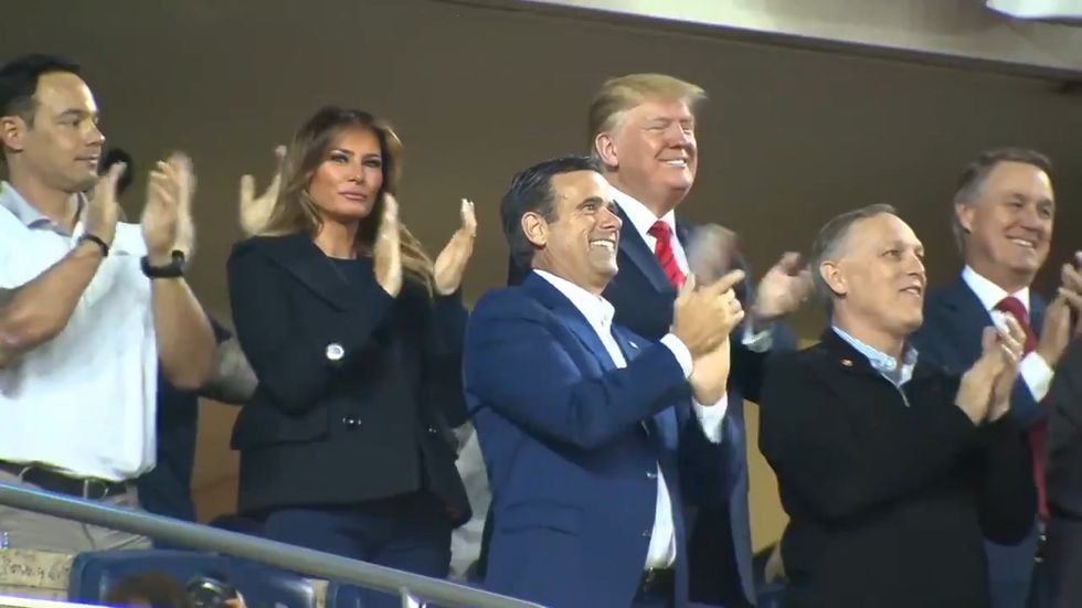 Donald Trump booed at baseball game amid 'lock him up' chants