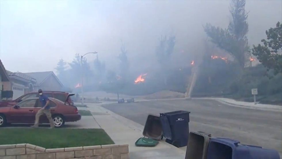 California wildfires spread prompting evacuation of 50,000 people