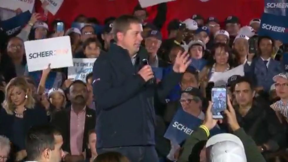 Andrew Scheer's supporters chant 'lock him up' about Justin Trudeau 