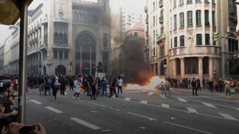Protesters clash with police in Barcelona