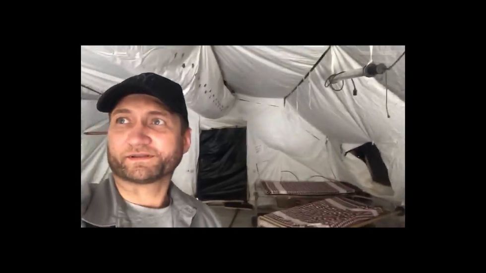 Journalist Oleg Blokhin films inside abandoned US base in Manbij Syria as Russian troops enter site