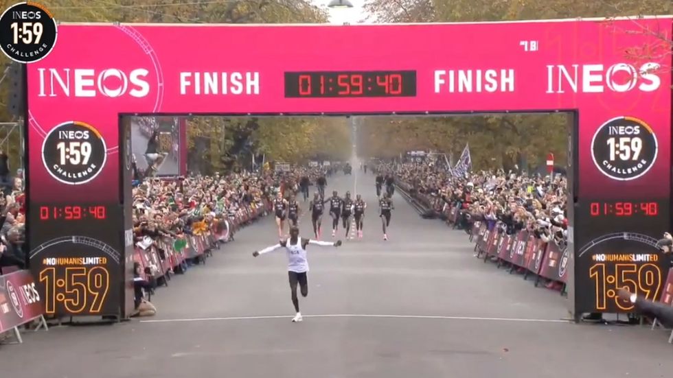 Eliud Kipchoge becomes first athlete to run marathon under two hours