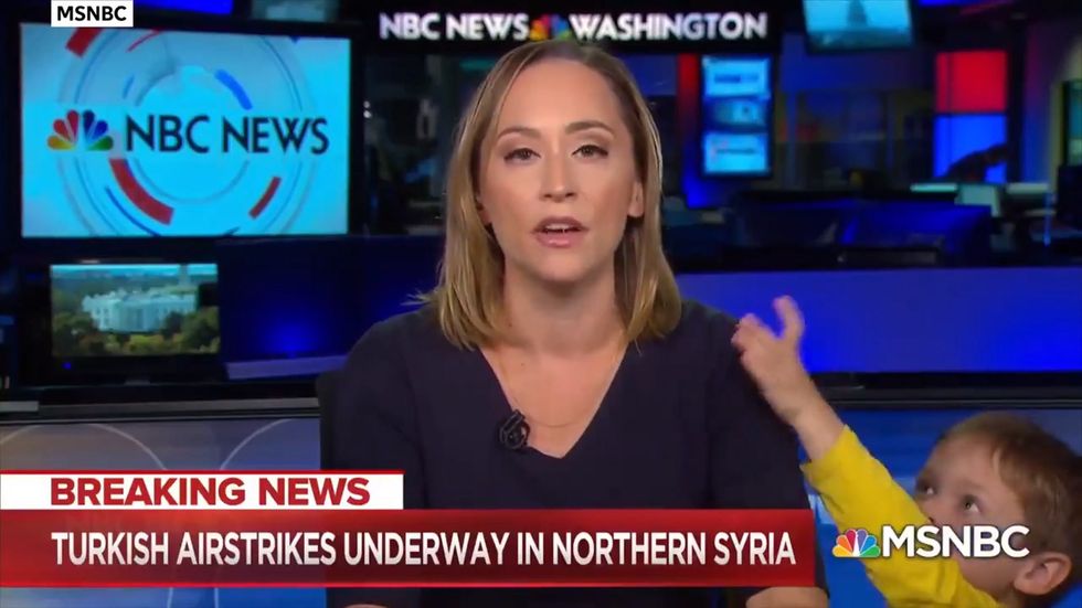 MSNBC presenter interrupted by son live on air