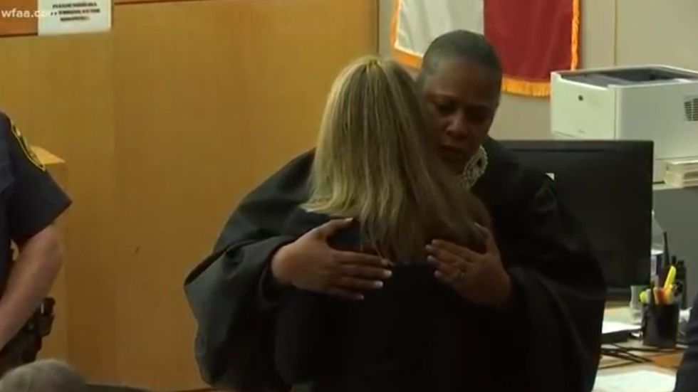 Judge hugs police officer convicted of murdering black man