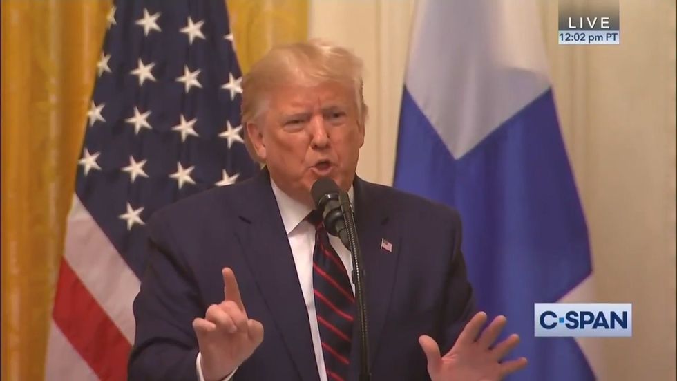 Donald Trump berates journalist Jeff Mason for pressing him on question 