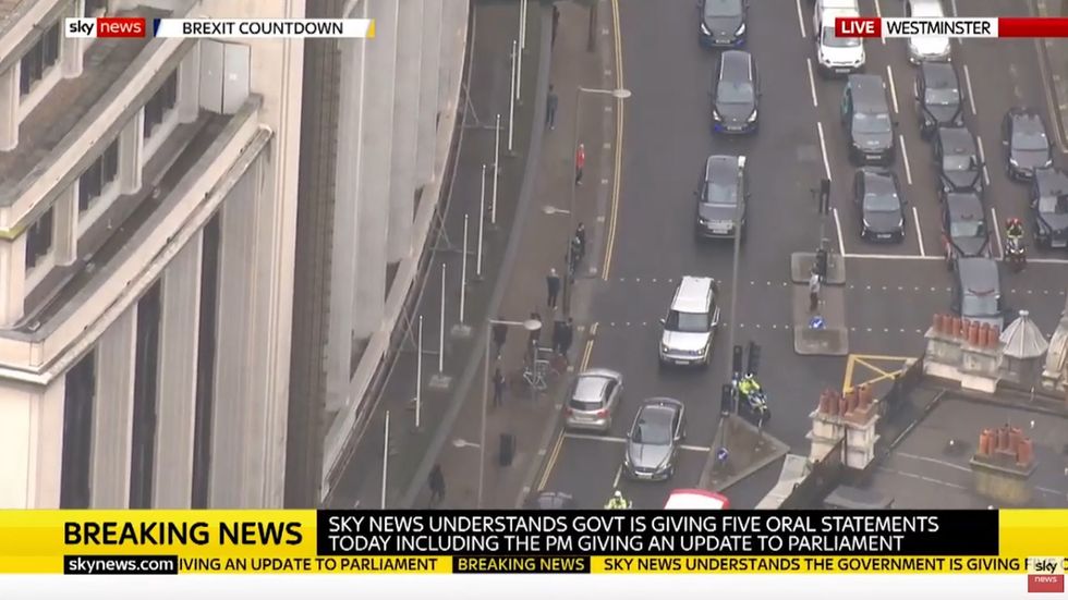 Boris Johnson's motorade drives in the wrong direction on a one way street