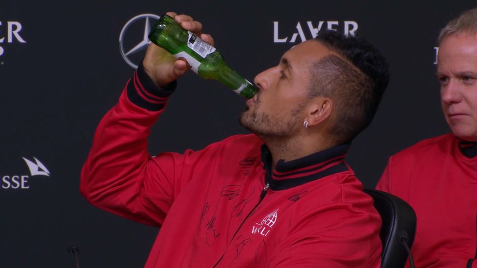 Nick Kyrgios ignores reporter's question and chugs beer during bizarre press conference