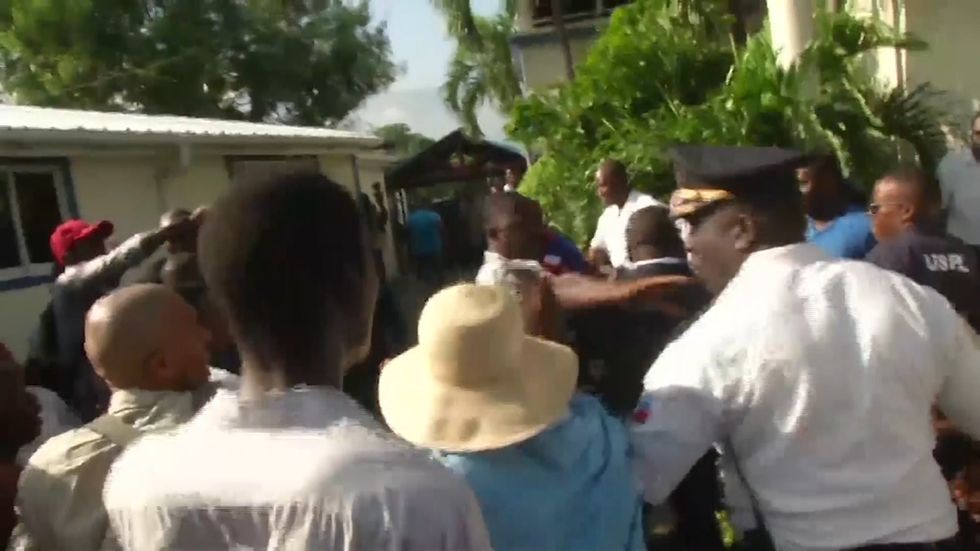 AP photographer wounded in Haiti shooting