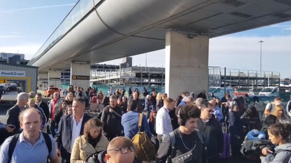 Queues at Manchester Airport as bomb squad carries out controlled explosion after suspicious package discovered