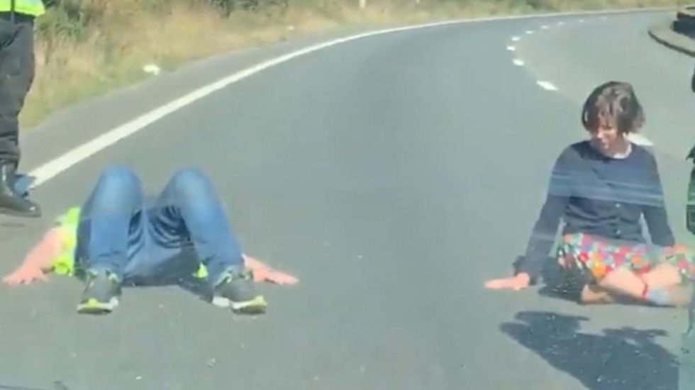 Extinction Rebellion protesters glue themselves to road near Port of Dover