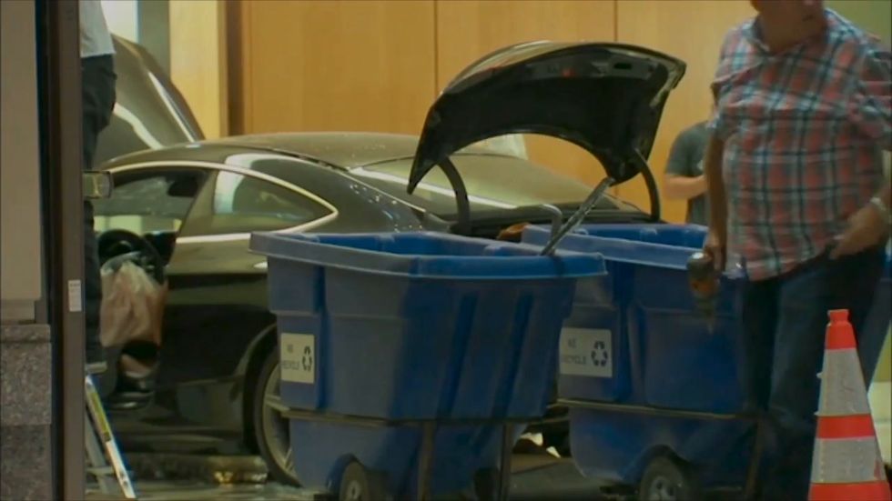 Three injured after car crashes into Trump Plaza in New York