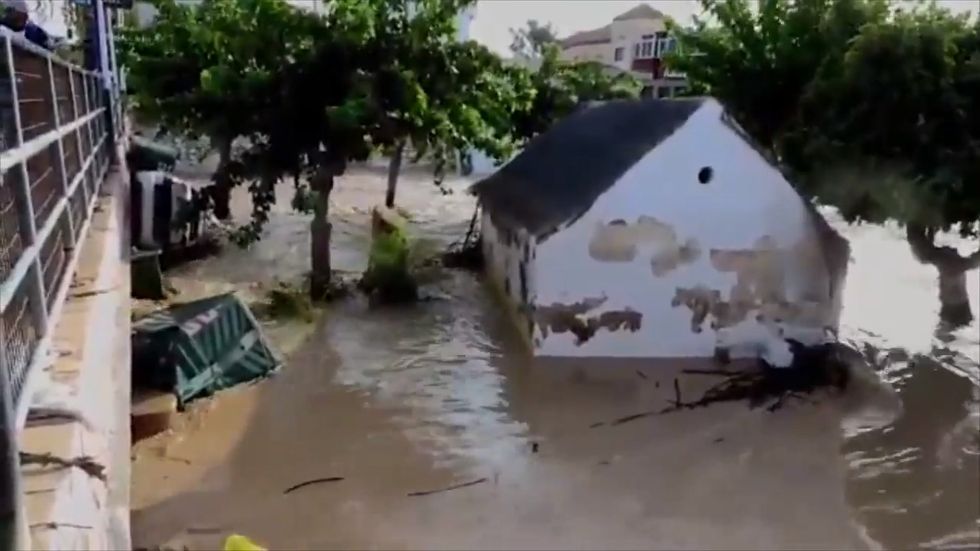 Spanish military help residents near Murcia as severe flooding hits region