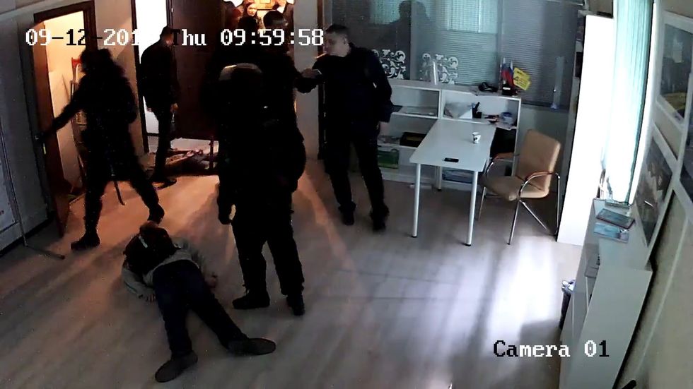 Russian police carry out raids against Alexei Navalny’s associates