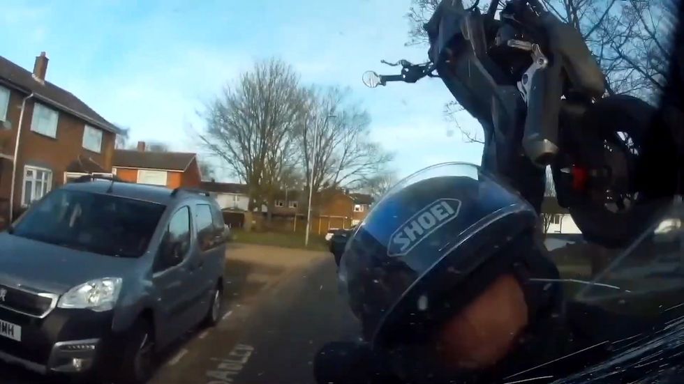 Dashcam footage shows drunk motorcyclist crash into car