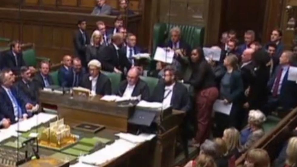 MPs 'pin Bercow to seat' in protest at Parliament suspension