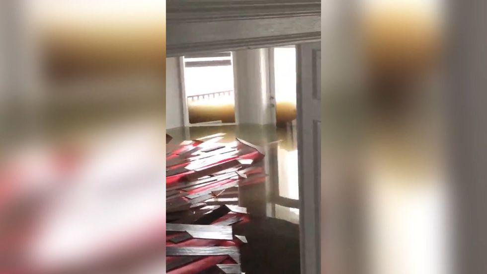 Bahamas Minister for Agriculture Michael Pintard describes flooding from Hurricane Dorian at his house