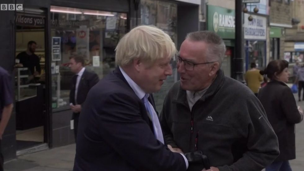 Boris Johnson  told to 'leave my town'