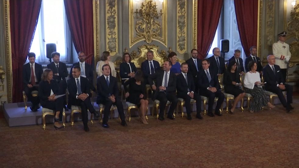 Italy's new coalition cabinet is sworn in