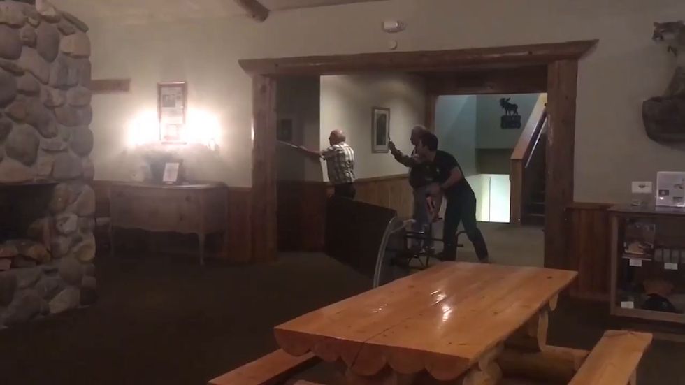 Baby bear takes nap in Montana hotel bathroom