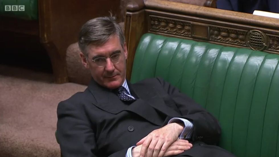 'Sit up man!' Jacob Rees-Mogg lies across seats in parliament