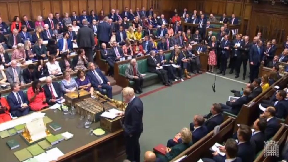 Boris Johnson loses majority as Philip Lee crosses Commons chamber to join Lib Dems