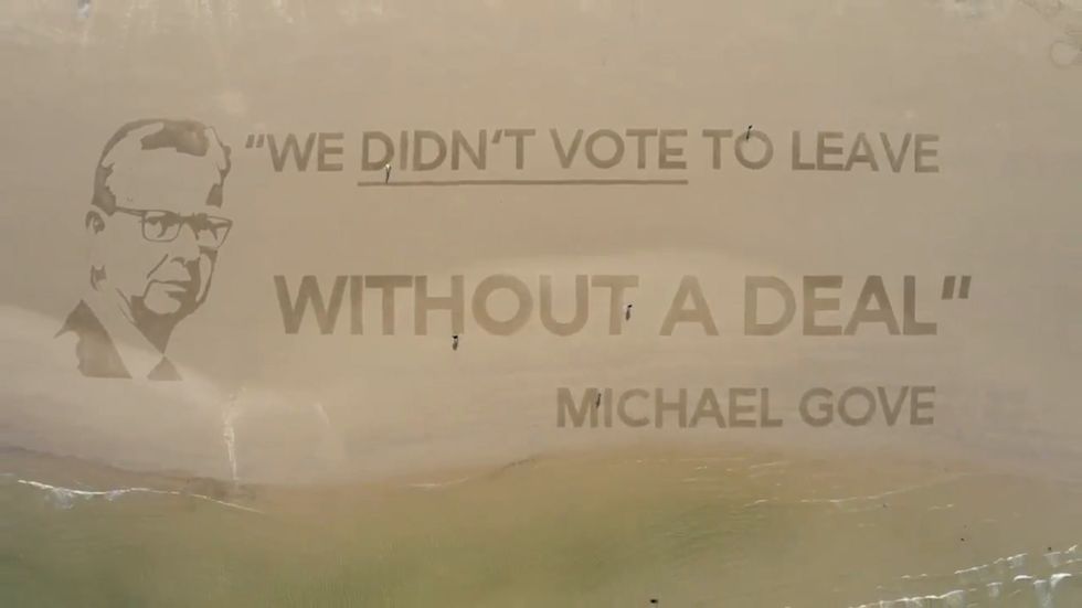 Michael Gove trolled with sand portrait 'visible from space' in latest Led By Donkeys stunt