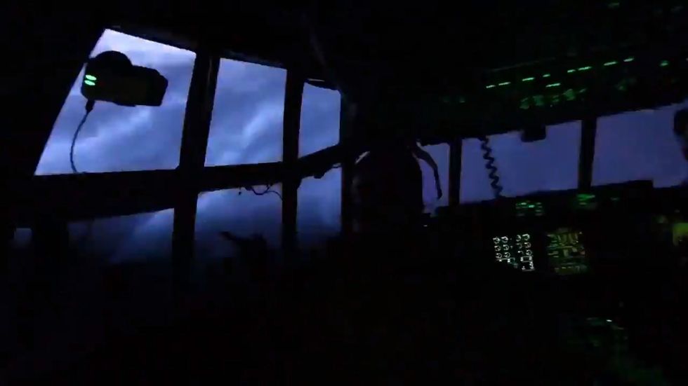 Military fly through Hurricane Dorian in dramatic video