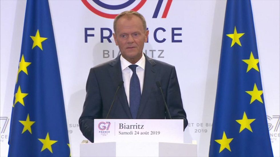 Donald Tusk says 'under no condition' can G7 welcome Russia back as Trump suggested