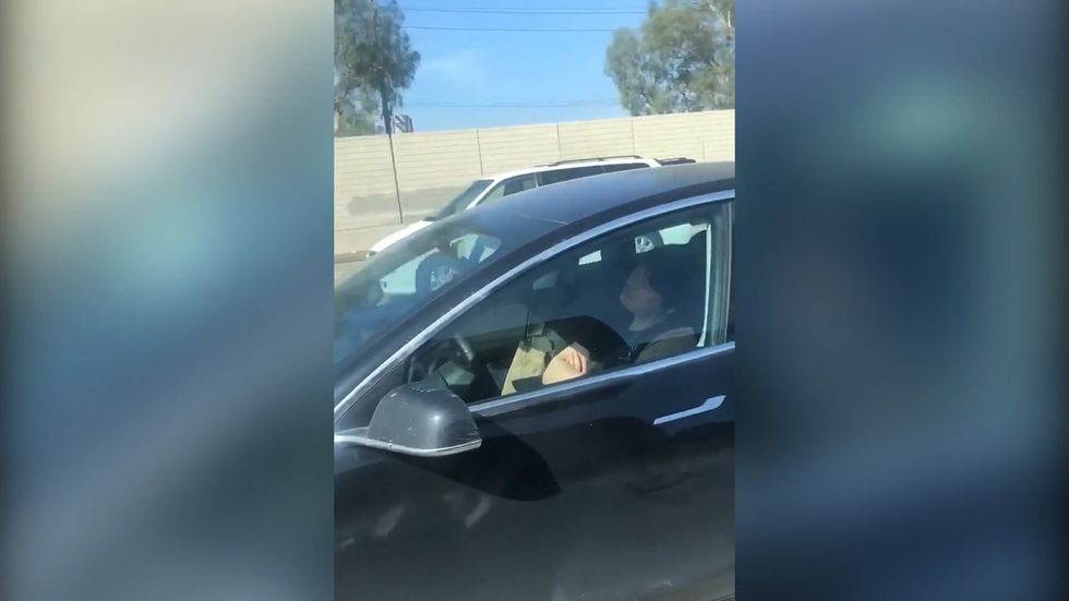 Man filmed 'asleep' in Tesla in Los Angeles