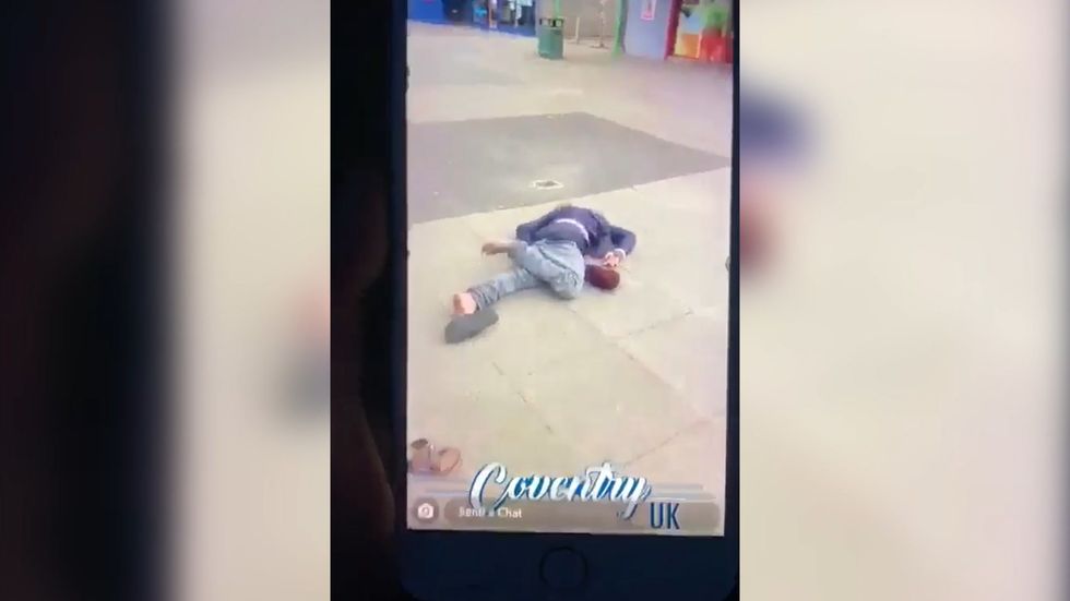 Homeless man 'kicked and pushed to the ground' by man pretending to help him