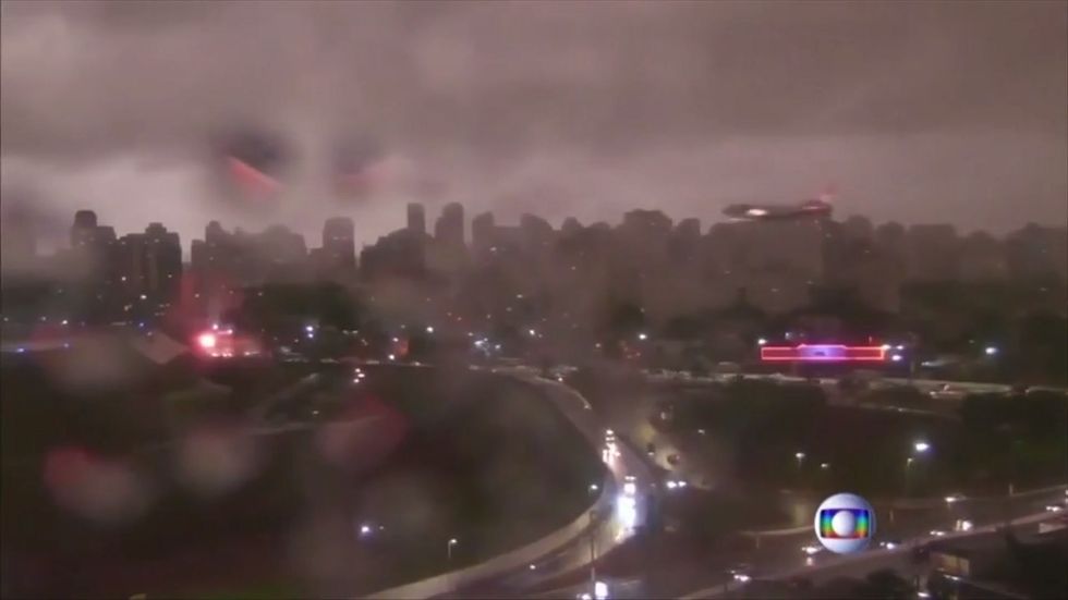 Sao Paulo pitched into darkness by smoke from forest fires