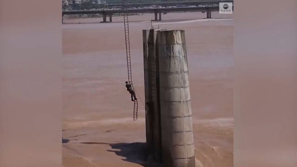 Fishermen stranded in flooded river rescued in India