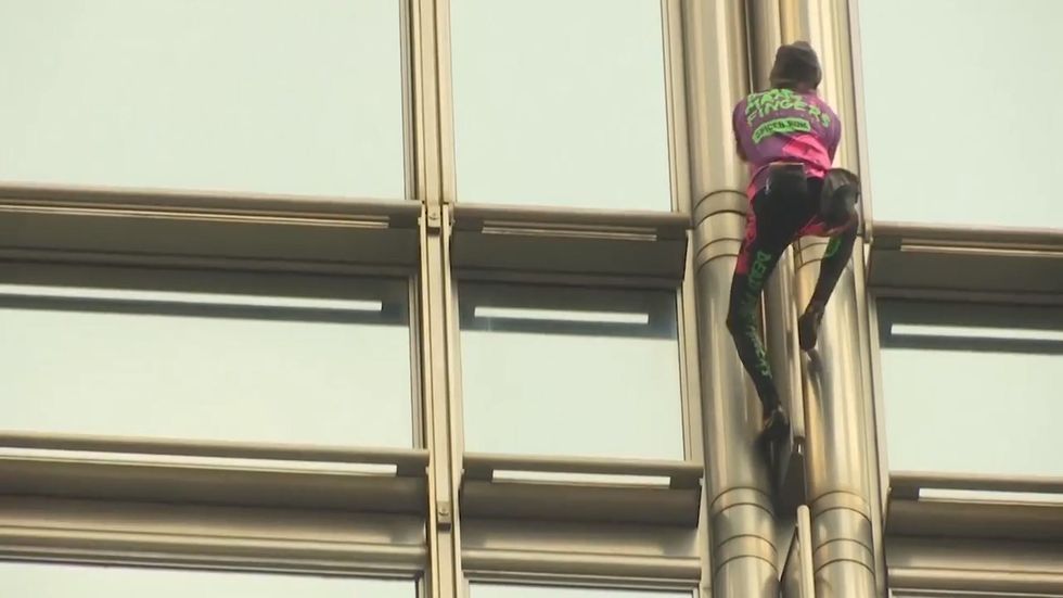 French 'Spiderman' climbs skyscraper in Hong Kong